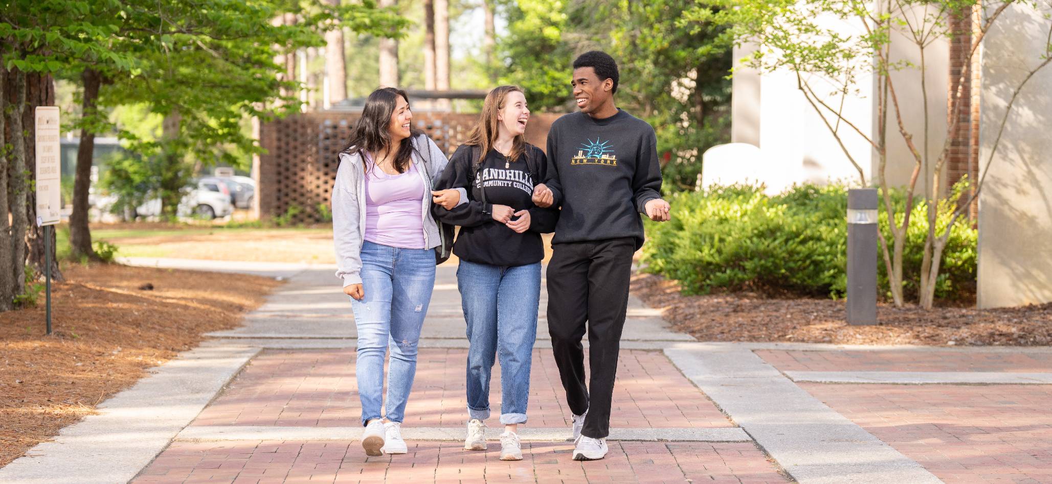 Thee Students walking on campus